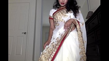Desi Babe In Sheer Saree Teasingly Strips Down And Fingers Her Dripping Wet Hairy Pussy