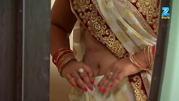Sultry Hindi Starlet Flaunts Her Deep, Scorching Navel In A Steamy Display