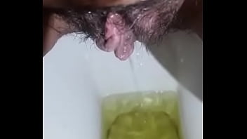 Desi Babe Unleashing A Golden Stream