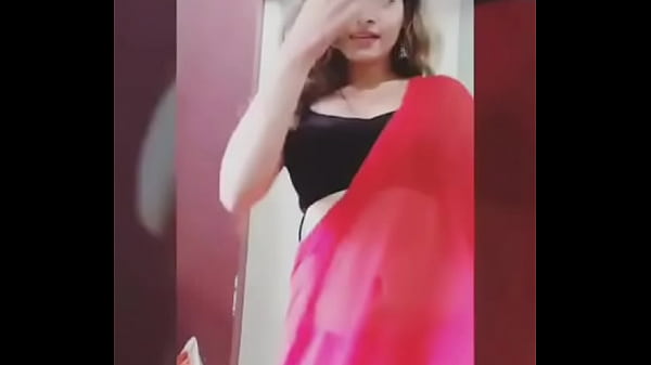 Sultry Desi Bhabhi’s Seductive Strip Tease