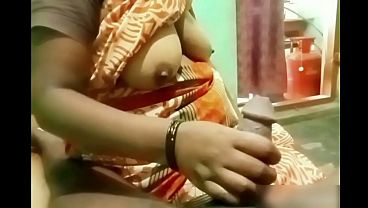 Indian Aunty’s Slick Hand Working A Young Boy’s Stiff Cock